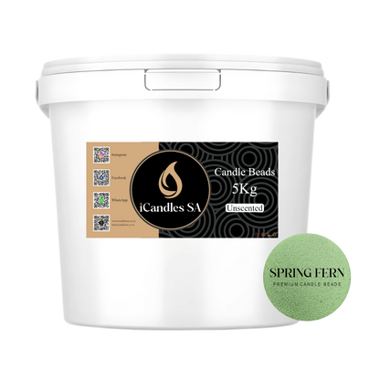 White bucket labeled 'Candle Beads 5Kg Unscented' by iCandles SA with Spring Fern candle bead sample on a white background.